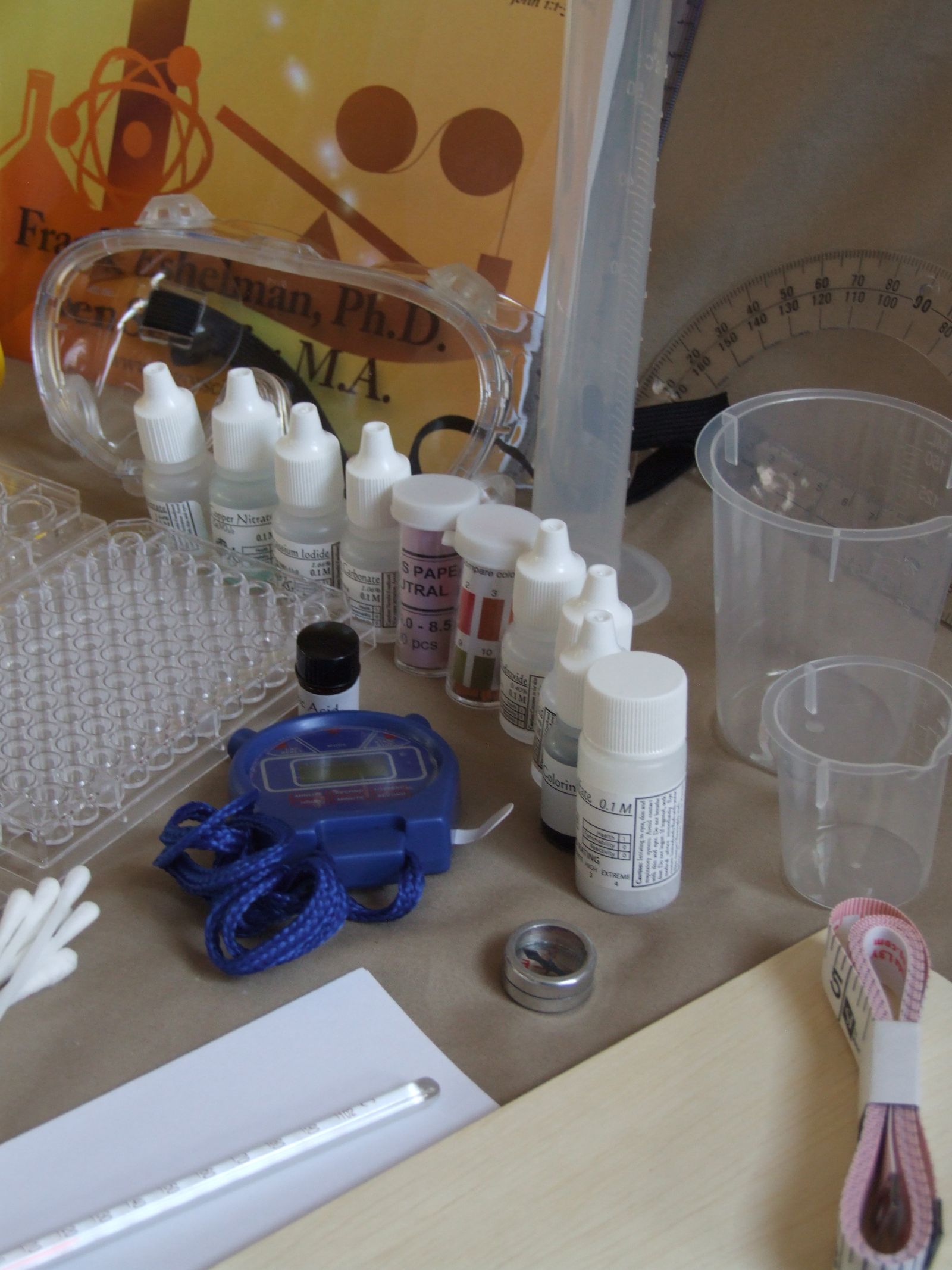 Graduated cylinders, beakers, protractor and reagent bottles